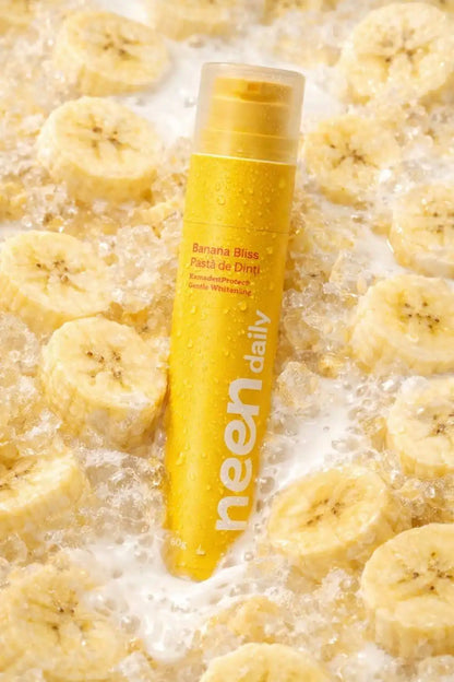 pasta de dinti neen daily banana bliss cu aroma de banana pentru albire delicata si protectie dentara zilnica